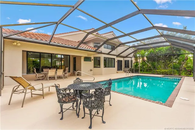 a view of a dining room with furniture wooden floor and a table