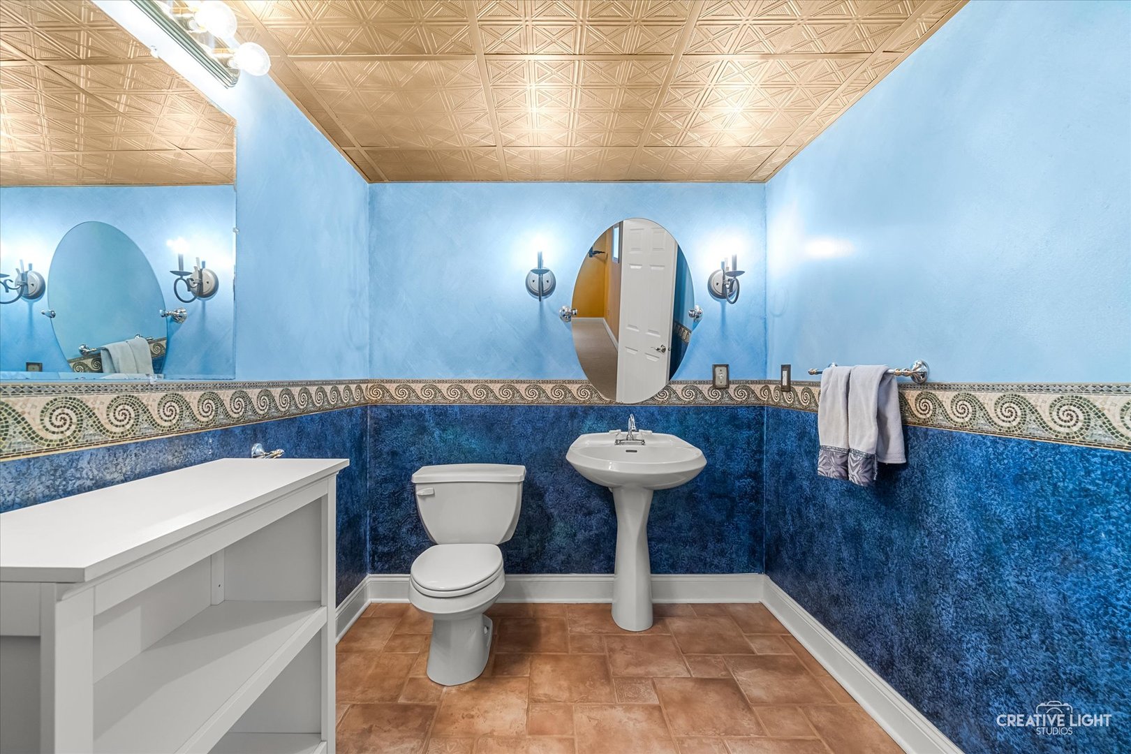 3160 Covered Bridge Lane DeKalb, IL 60115 - Photo 23 of 28 a bathroom with a toilet sink and mirror