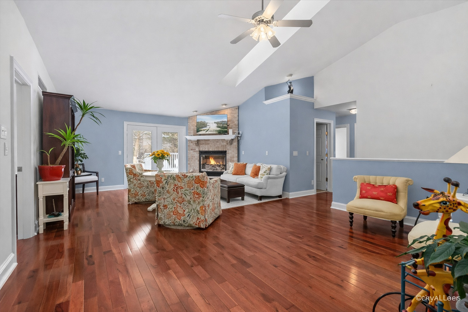 3160 Covered Bridge Lane DeKalb, IL 60115 - Photo 3 of 28 a living room with furniture and wooden floor