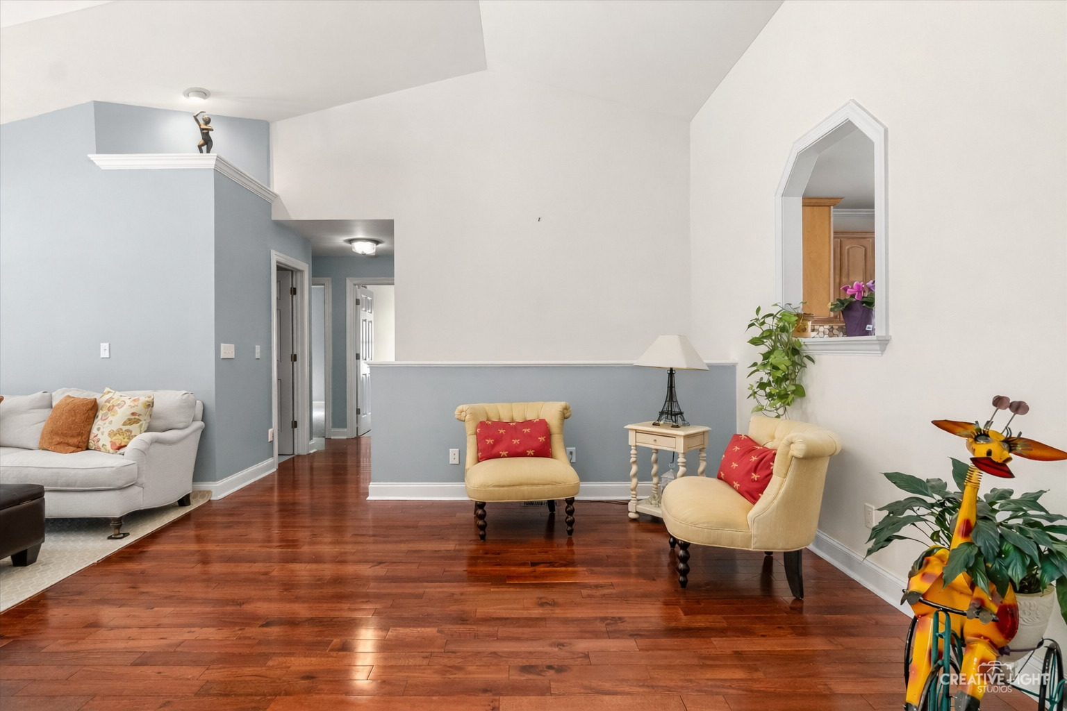 3160 Covered Bridge Lane DeKalb, IL 60115 - Photo 4 of 28 a living room with furniture and a potted plant