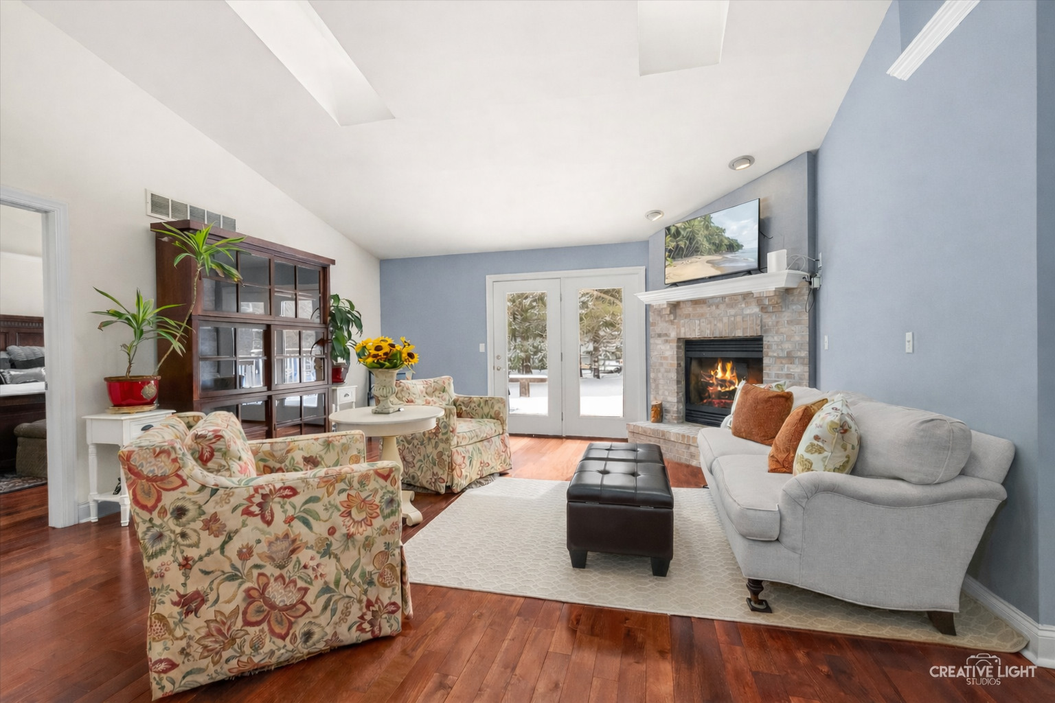 3160 Covered Bridge Lane DeKalb, IL 60115 - Photo 5 of 28 a living room with furniture and a fireplace