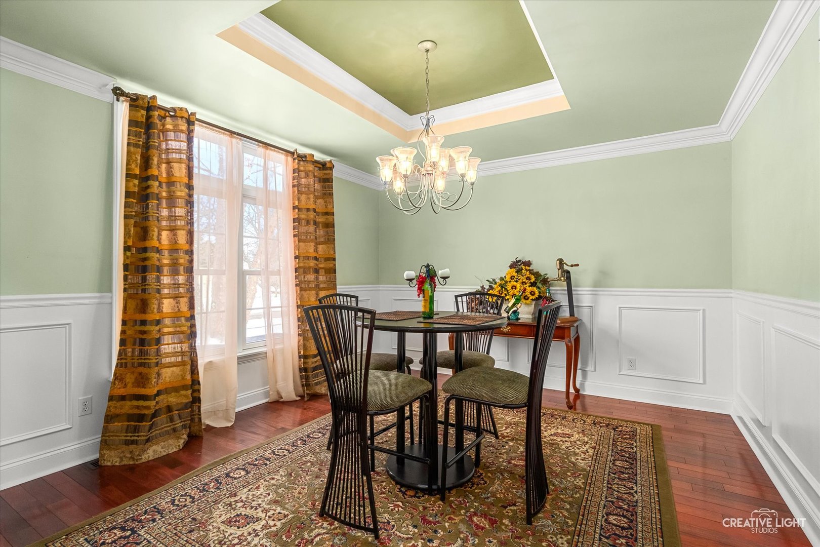 3160 Covered Bridge Lane DeKalb, IL 60115 - Photo 10 of 28 a view of a dining room with furniture and wooden floor