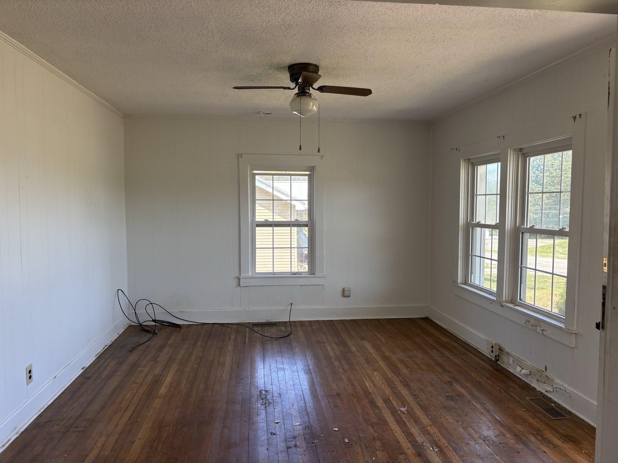 104 General Avenue Centerville, TN 37033 - Photo 5 of 11 wooden floor in an empty room with a window