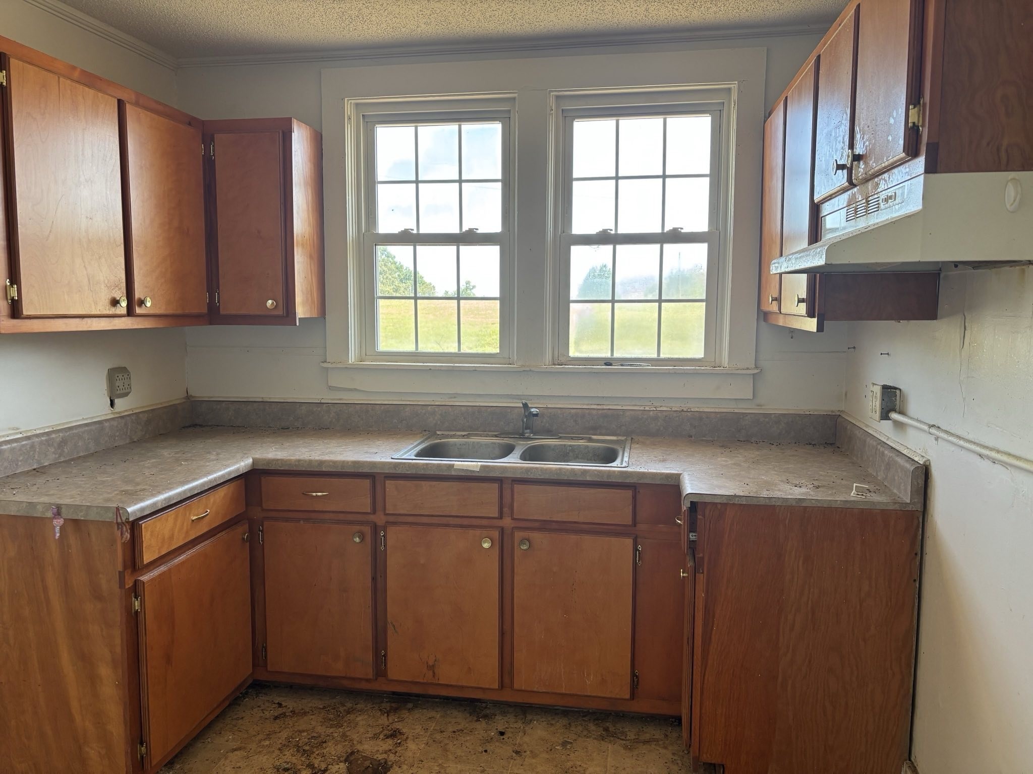 104 General Avenue Centerville, TN 37033 - Photo 6 of 11 a kitchen with a sink cabinets and window