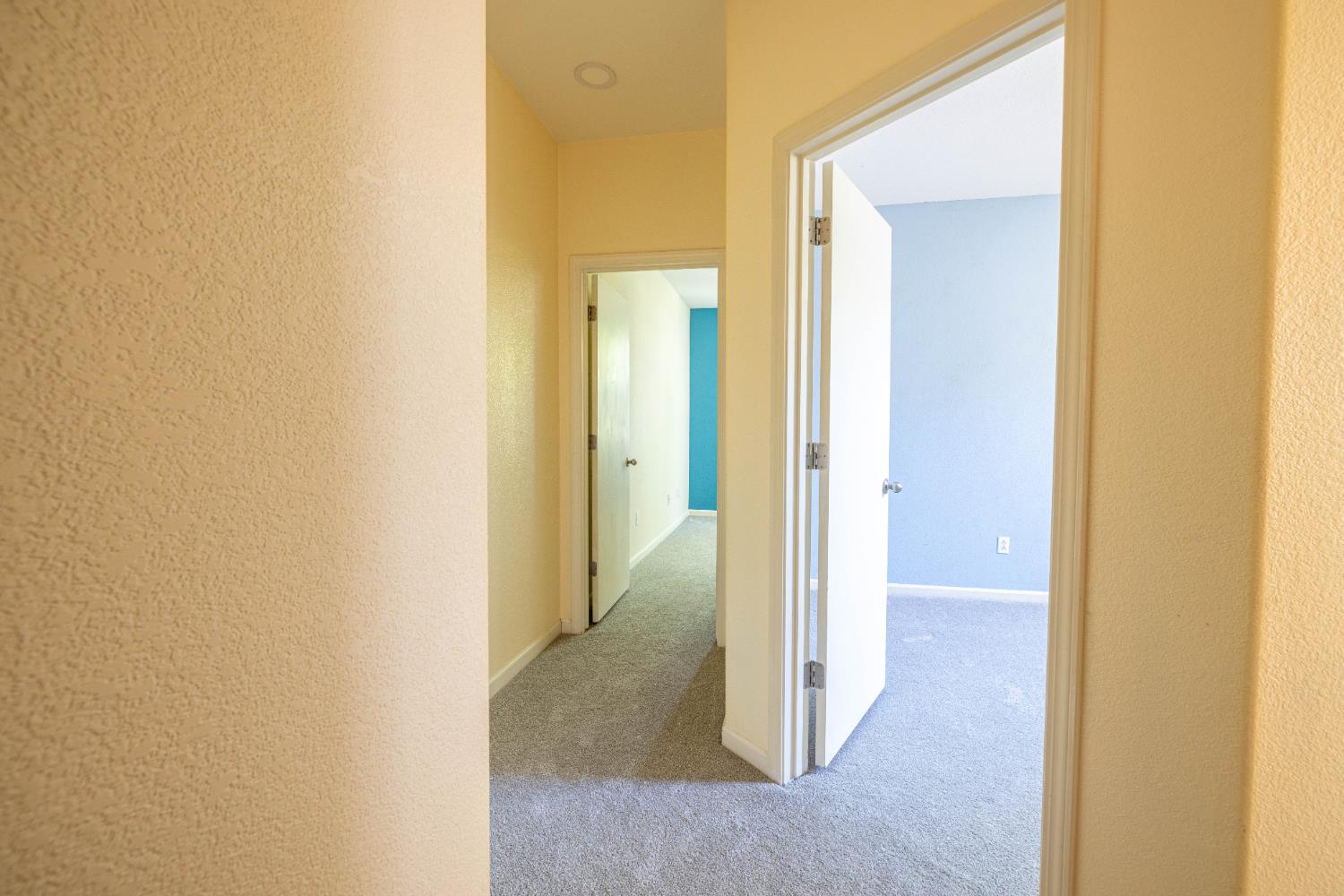 3122 Lea Sterling Way Rancho Cordova, CA 95670 - Photo 18 of 31 a view of a bathroom from a hallway