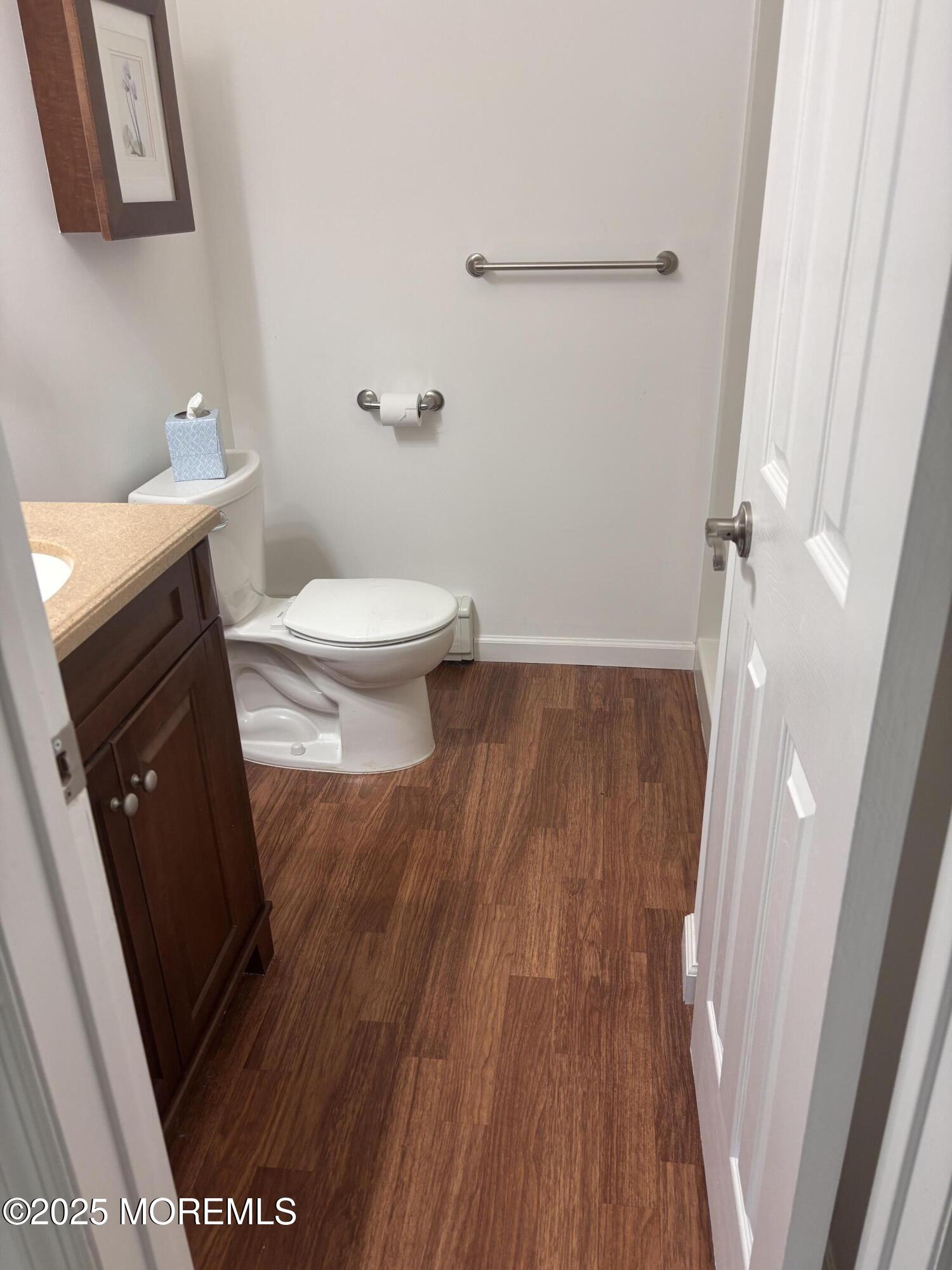 12 Dawn Way Toms River, NJ 08757 - Photo 12 of 19 a bathroom with a sink and toilet