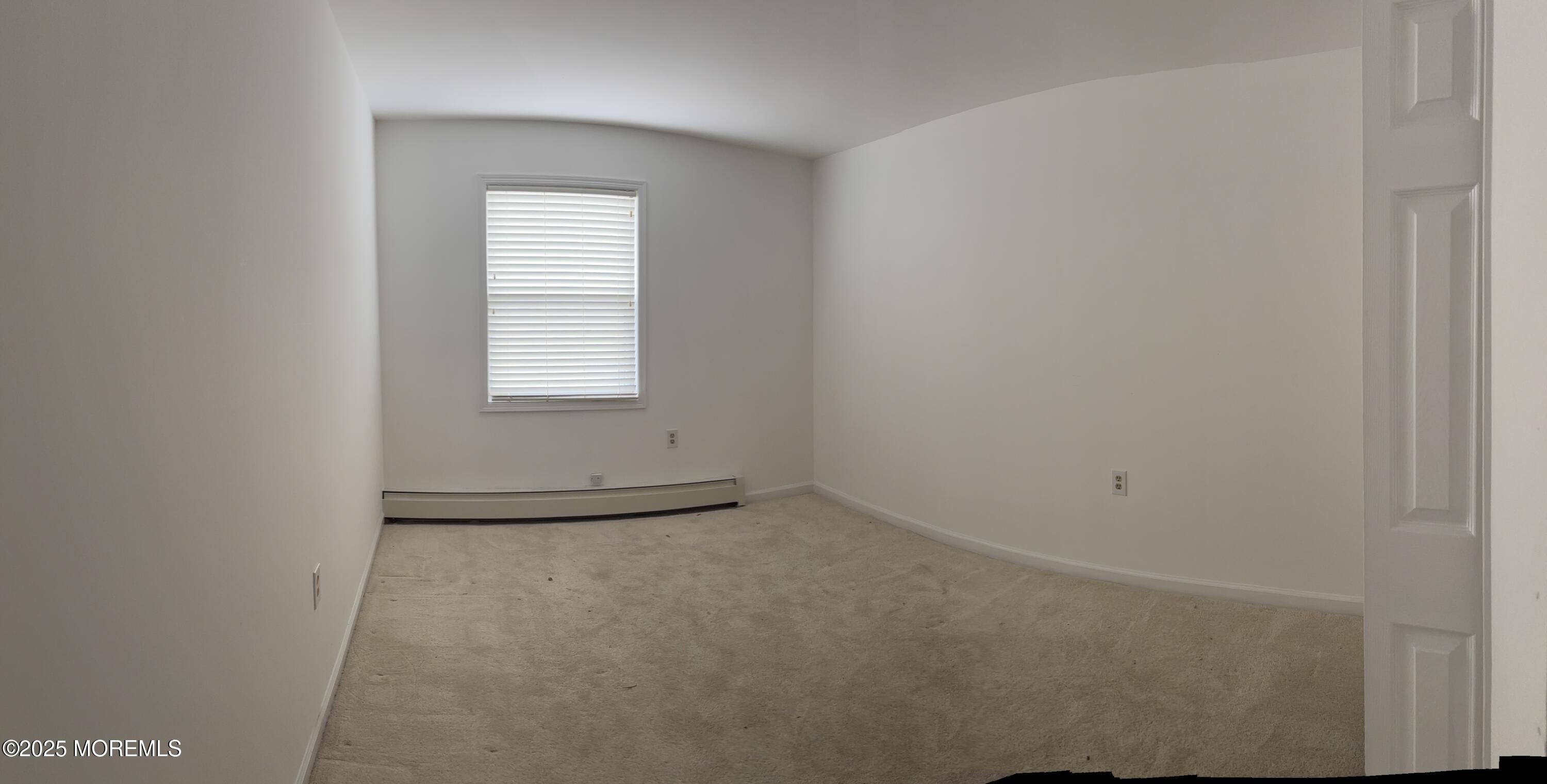 12 Dawn Way Toms River, NJ 08757 - Photo 14 of 19 a view of an empty room with a window