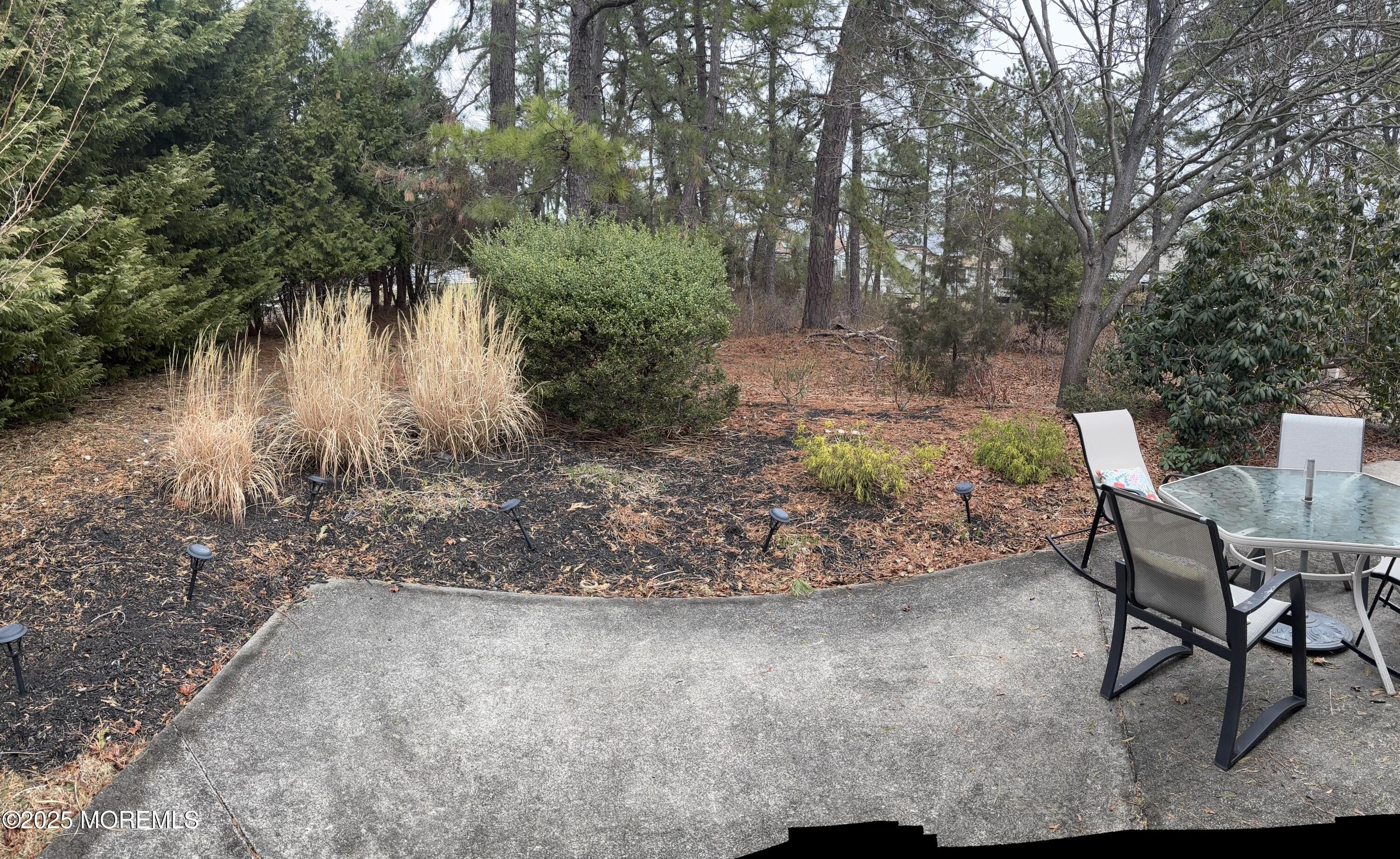 12 Dawn Way Toms River, NJ 08757 - Photo 19 of 19 a view of a chairs and table in the backyard