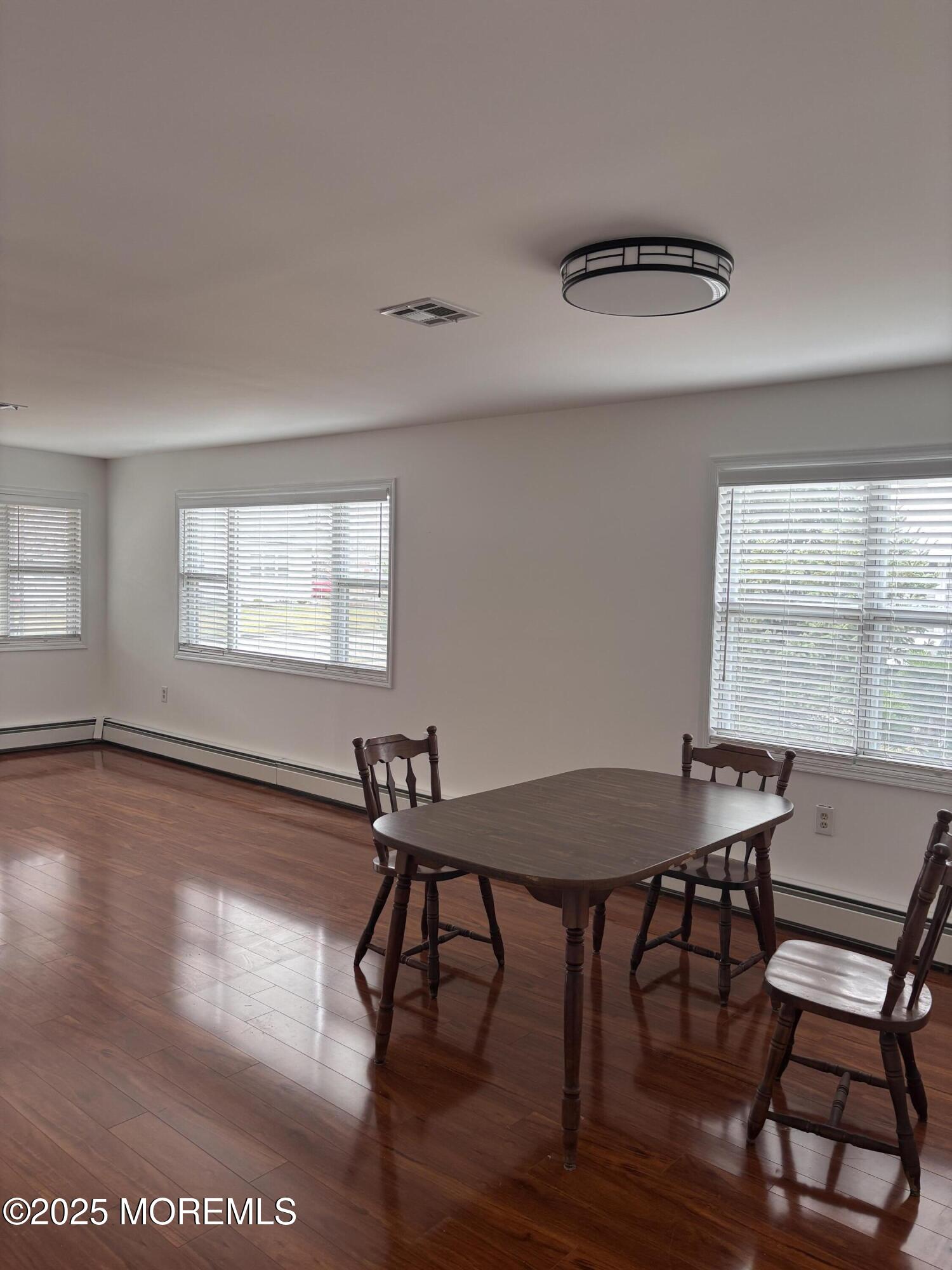 12 Dawn Way Toms River, NJ 08757 - Photo 4 of 19 a view of a dining room with furniture window and wooden floor