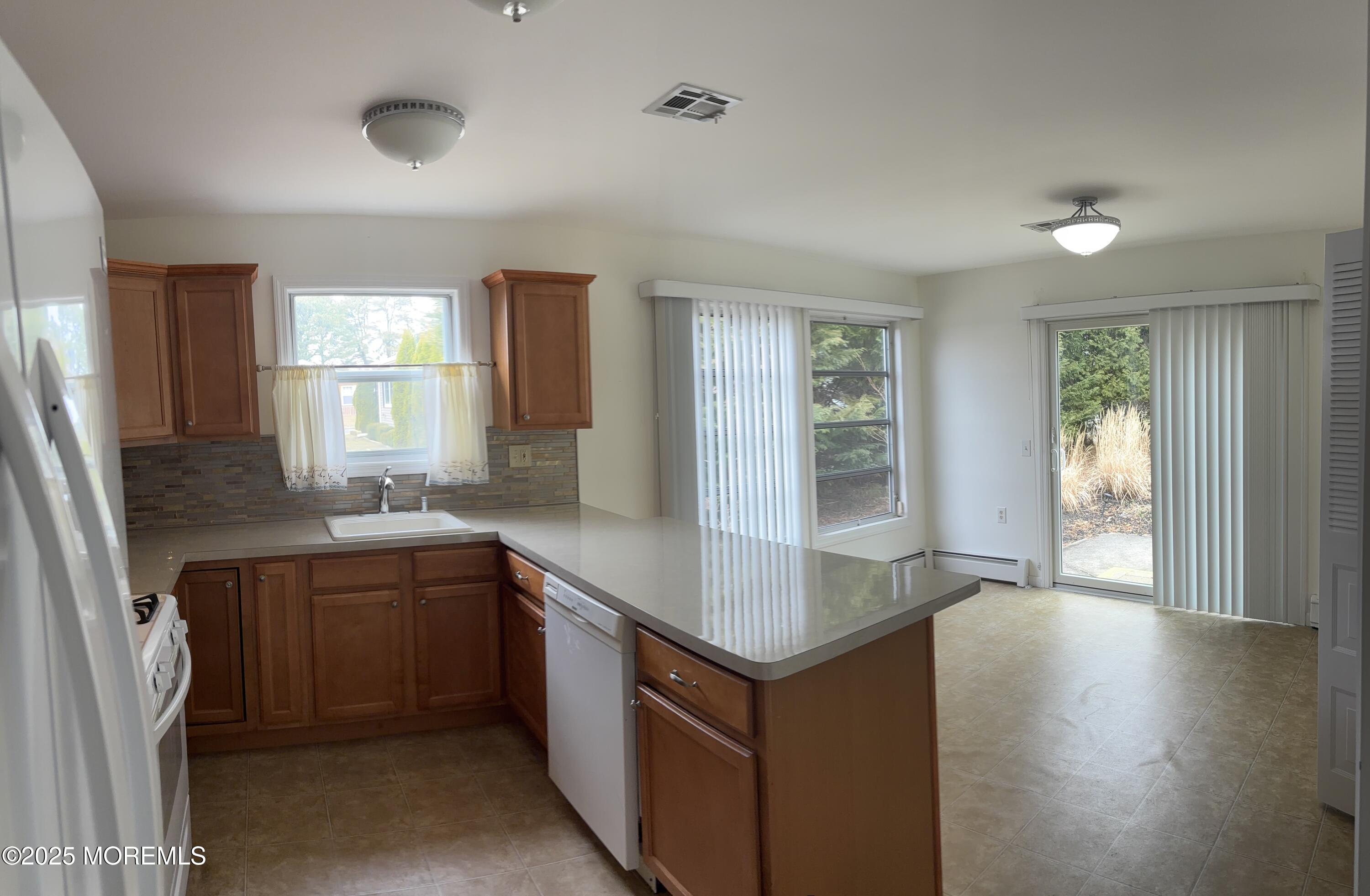 12 Dawn Way Toms River, NJ 08757 - Photo 5 of 19 a kitchen with a sink and cabinets
