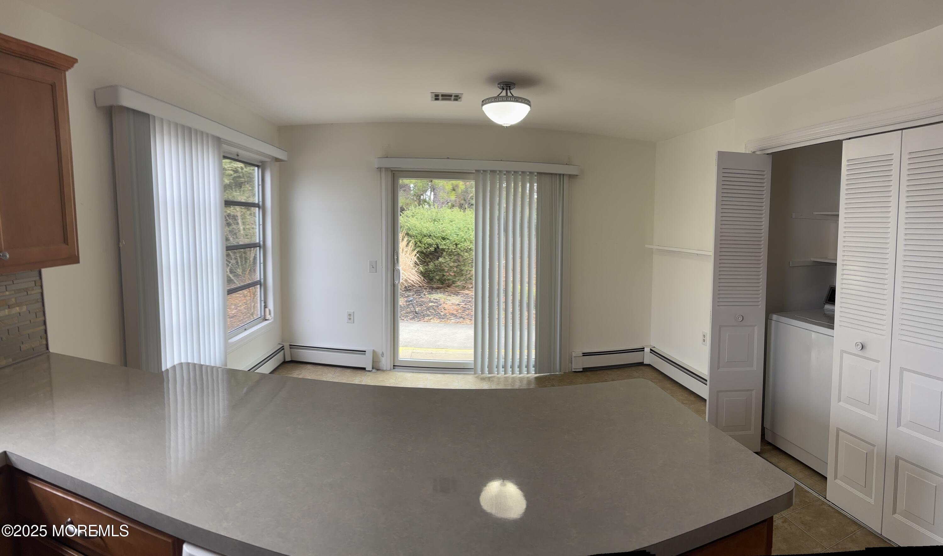 12 Dawn Way Toms River, NJ 08757 - Photo 7 of 19 an empty room with windows