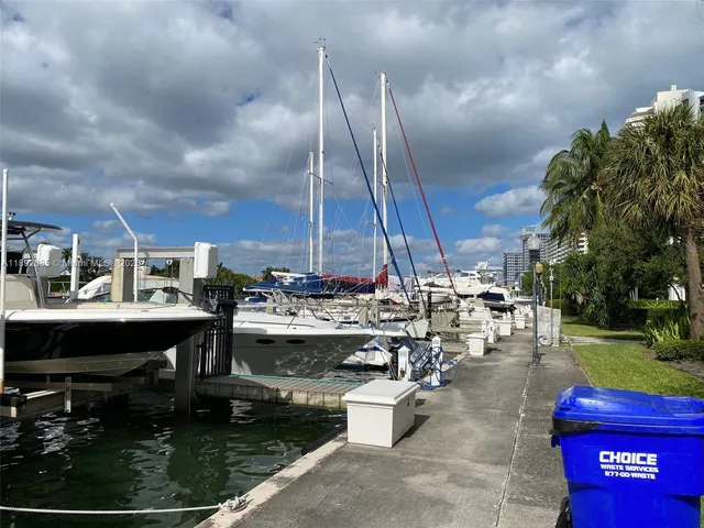 a view of city from balcony with outdoor seating