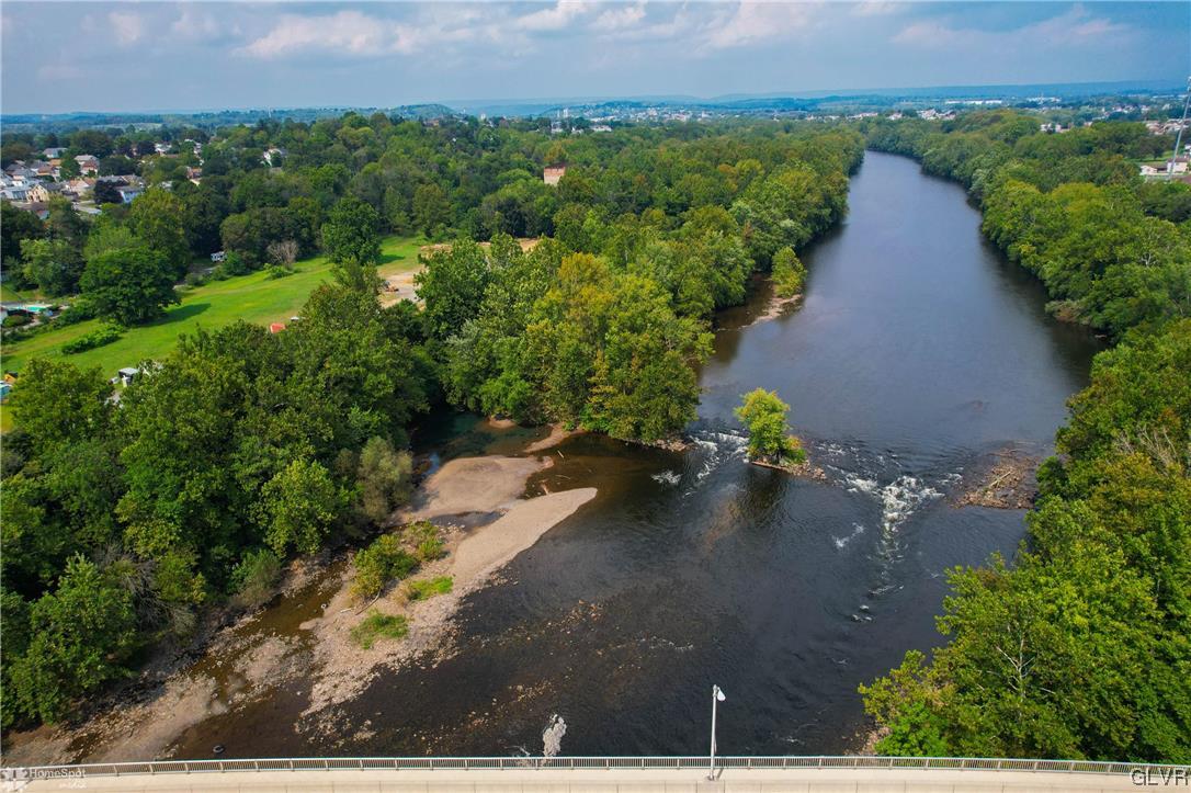 3161 East Church Street Coplay, PA 18037 - Photo 2 of 17 a view of a pathway with a yard