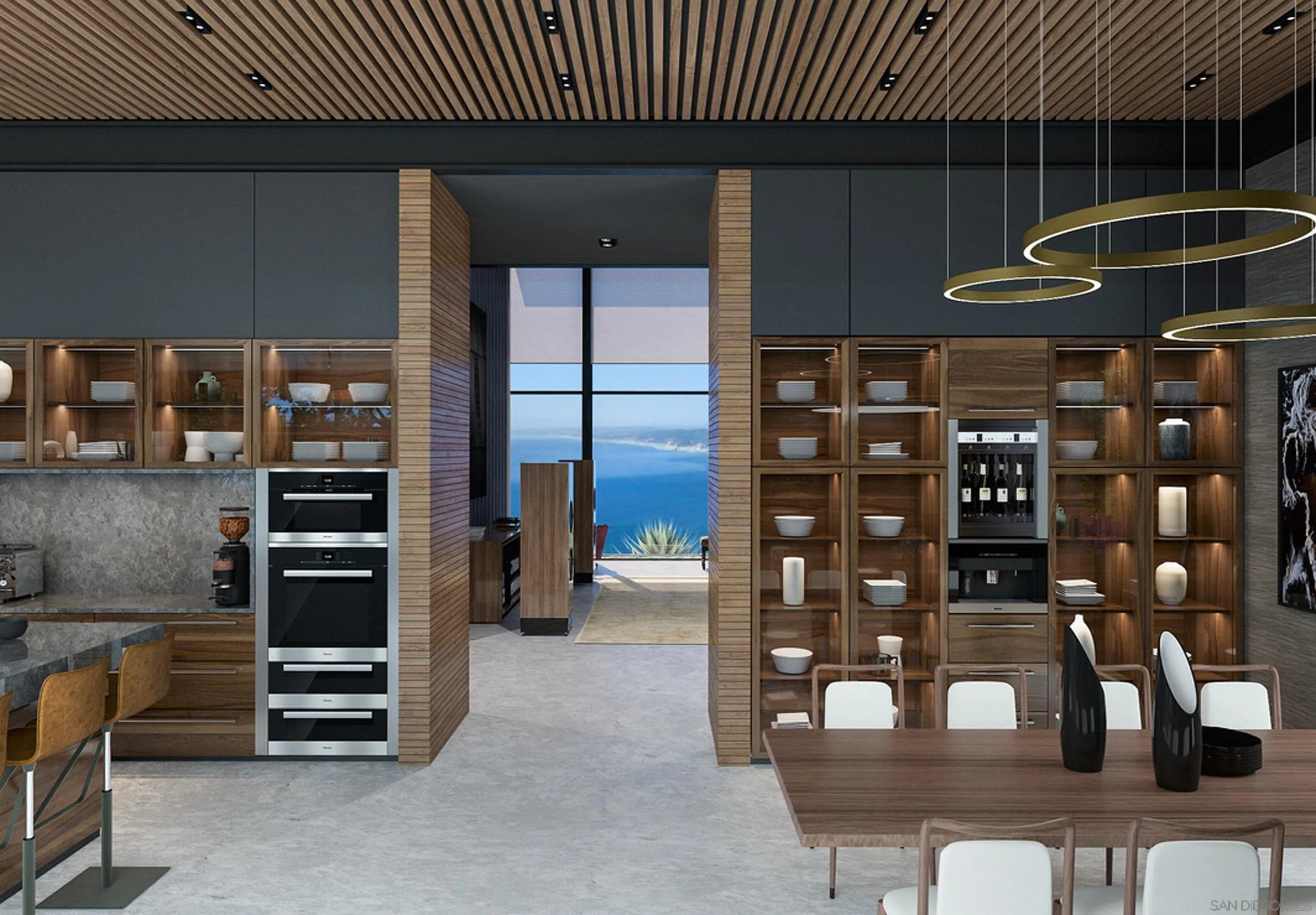 7362 Brodiaea Way La Jolla, CA 92037 - Photo 21 of 32 a kitchen with a table and chairs