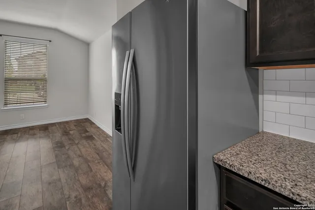 a view of a kitchen cabinets