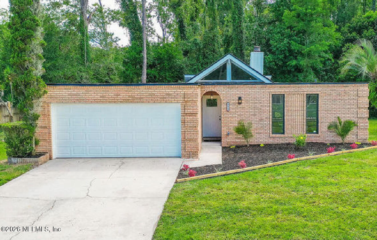 8618 Boxberry Lane Jacksonville, FL 32244 - Photo 1 of 18 a view of outdoor space yard and patio