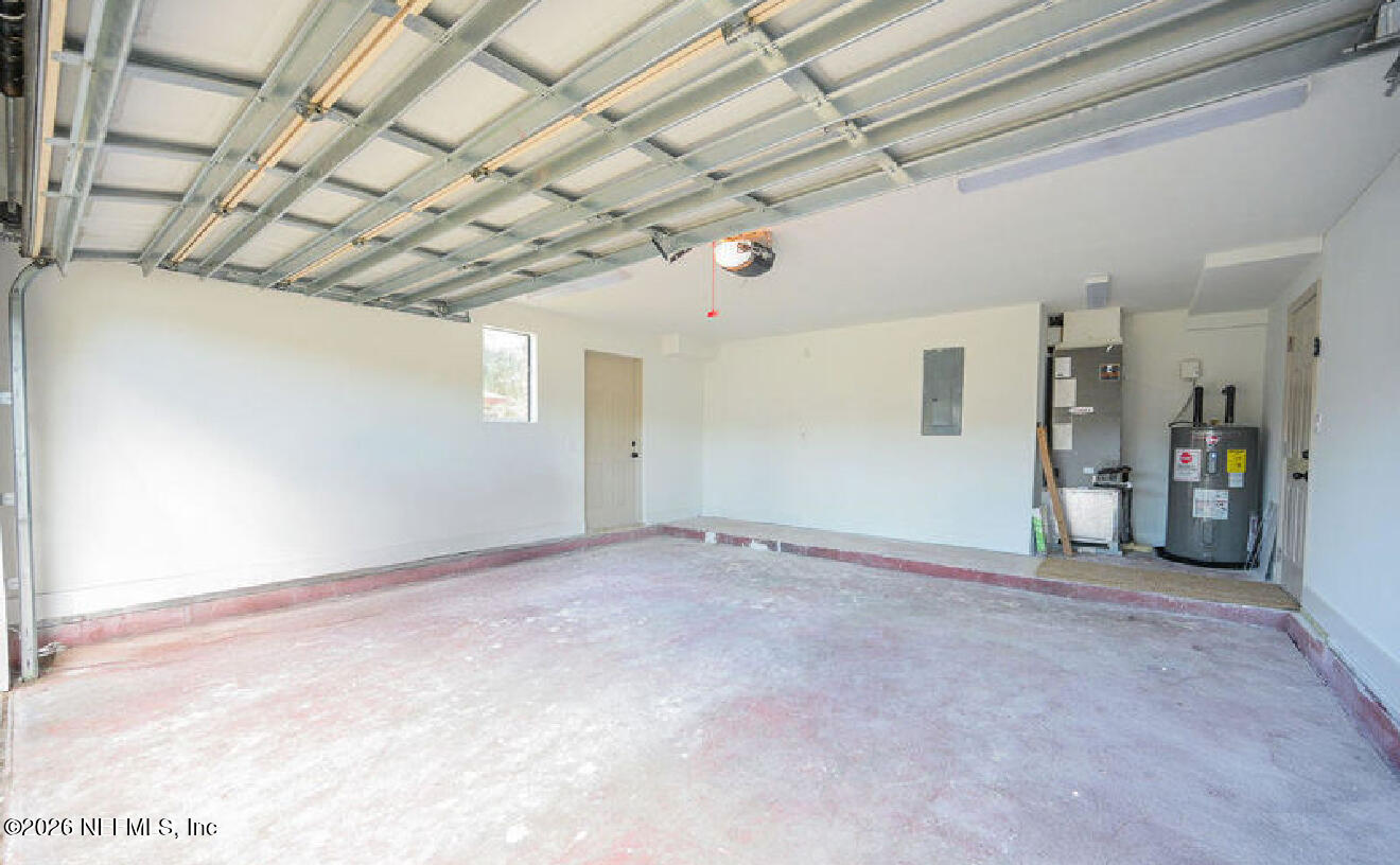 8618 Boxberry Lane Jacksonville, FL 32244 - Photo 11 of 18 a view of empty room with wooden ceiling