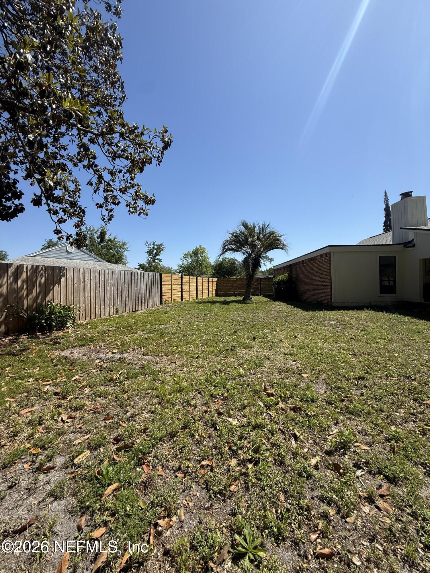 8618 Boxberry Lane Jacksonville, FL 32244 - Photo 16 of 18 a view of a backyard