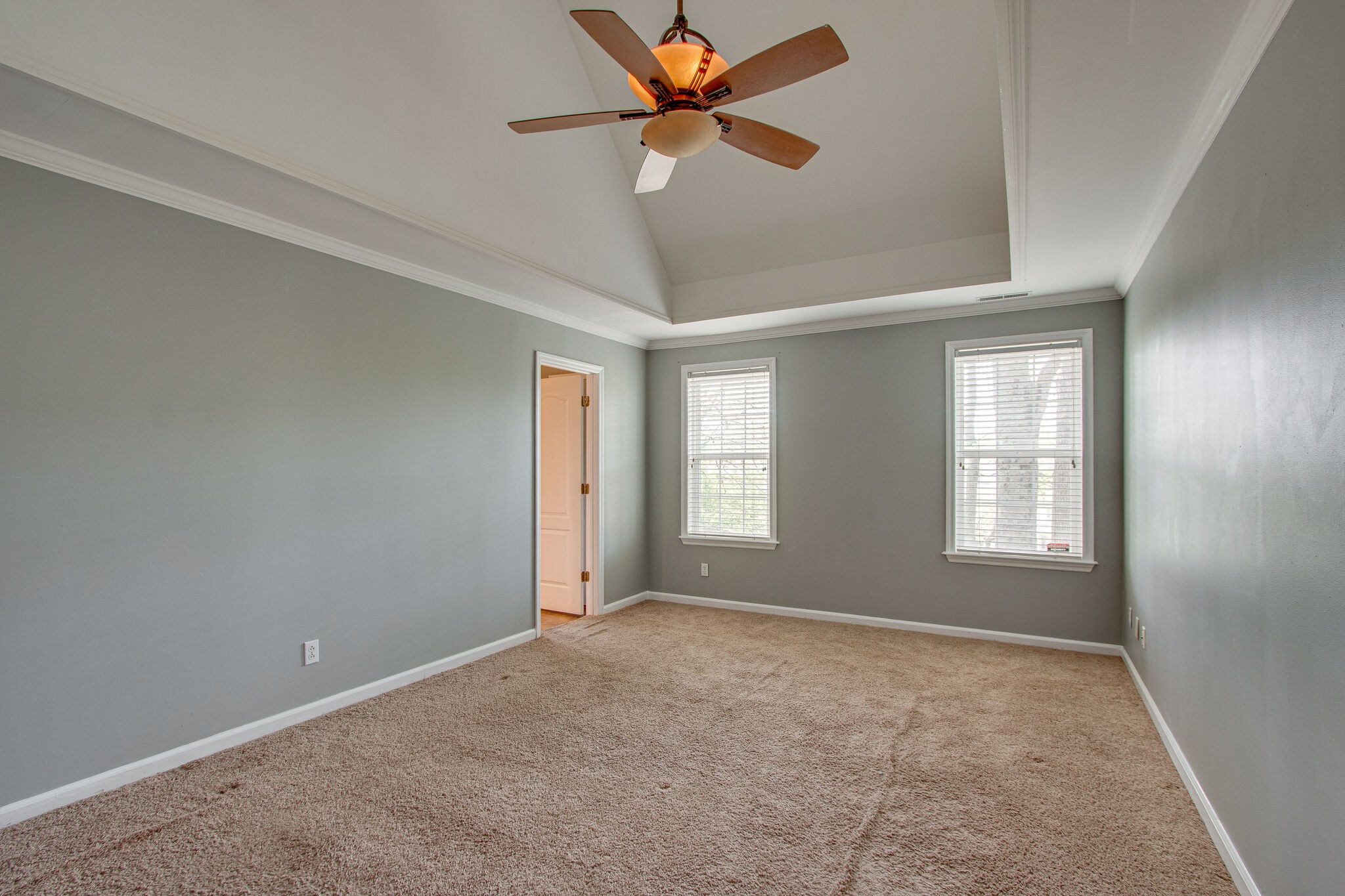 1615 Pacer Court Spring Hill, TN 37174 - Photo 16 of 30 a view of a room with windows and a ceiling fan