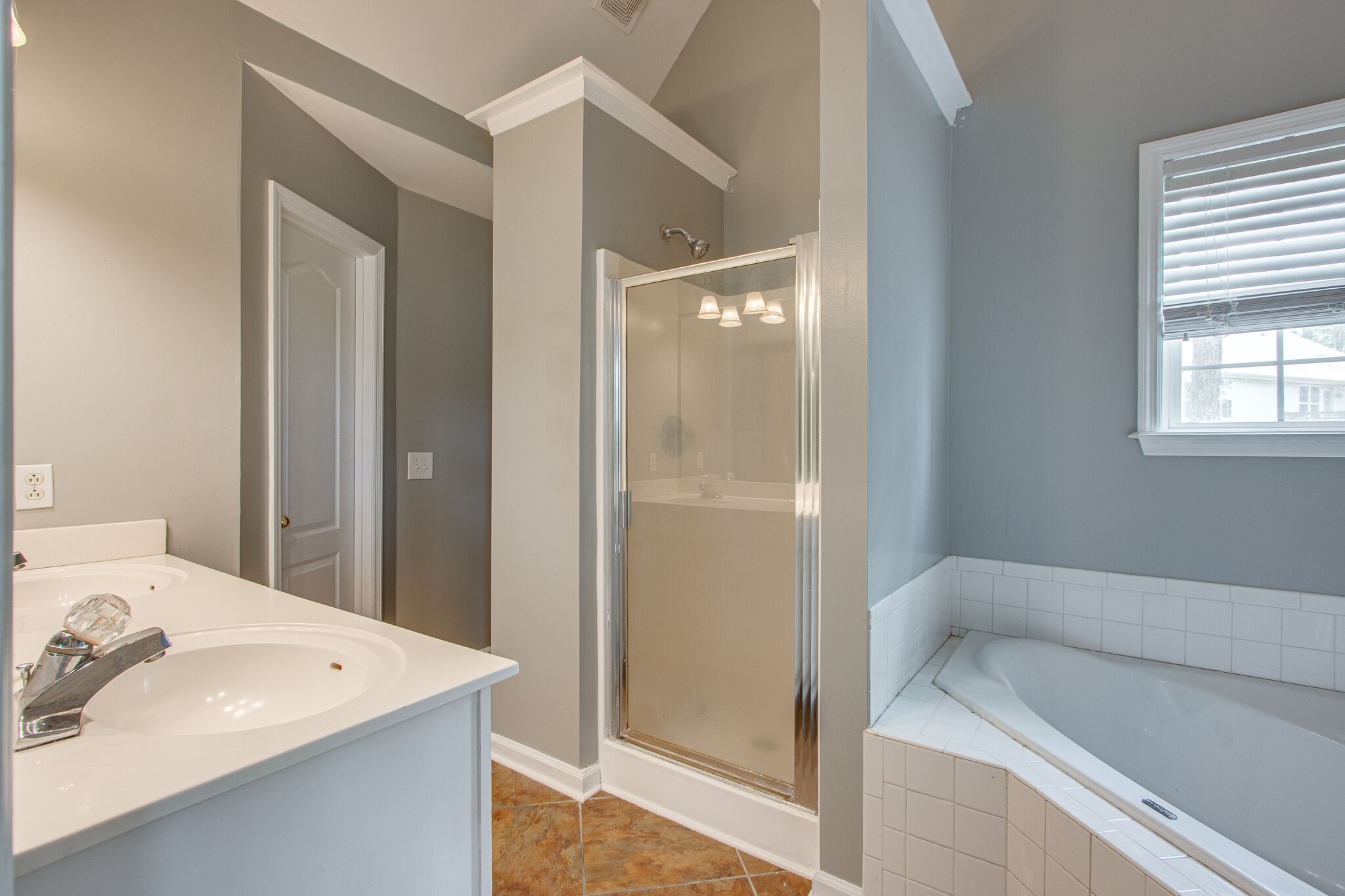1615 Pacer Court Spring Hill, TN 37174 - Photo 18 of 30 a en suite bathroom with a sink and a mirror