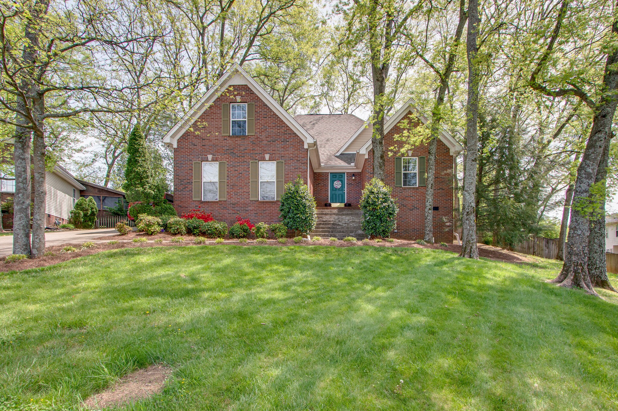 1615 Pacer Court Spring Hill, TN 37174 - Photo 3 of 30 a front view of house with yard and green space