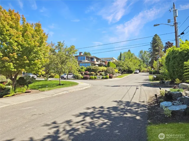 a view of a street with houses
