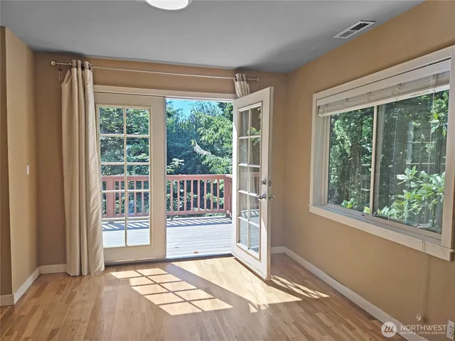 a view of a room with a large window