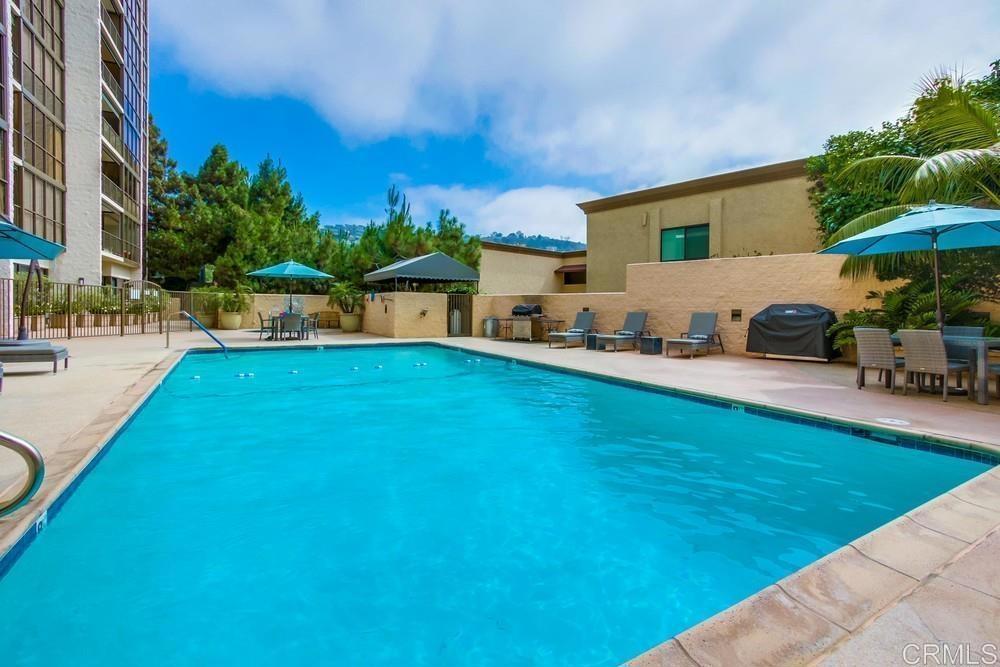 2500 Torrey Pines Road, Unit 802 La Jolla, CA 92037 - Photo 26 of 40 a view of a swimming pool and lounge chairs