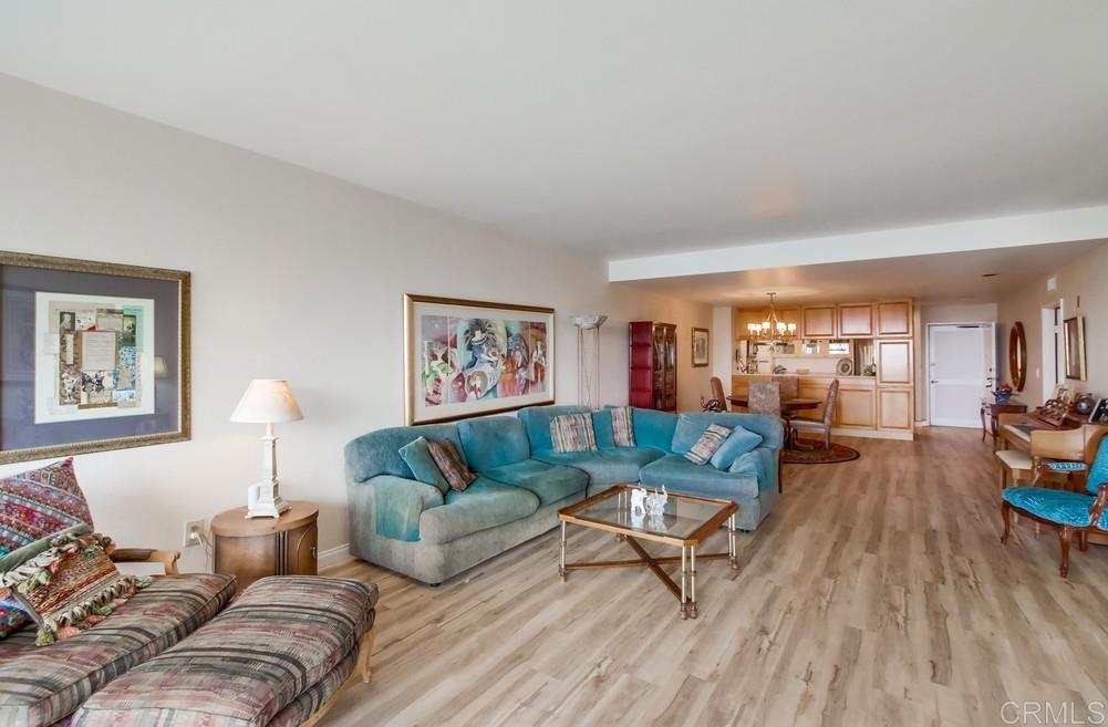 2500 Torrey Pines Road, Unit 802 La Jolla, CA 92037 - Photo 10 of 40 a living room with furniture and a wooden floor