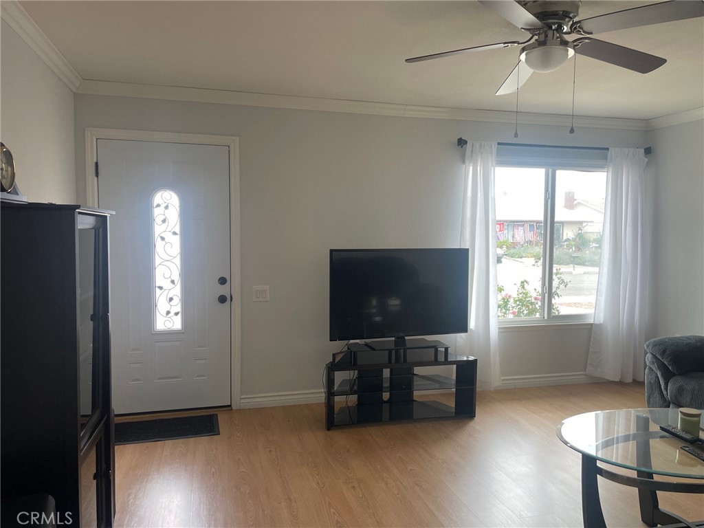 26592 Farrell Street Menifee, CA 92586 - Photo 13 of 31 a view of a livingroom with furniture and a window