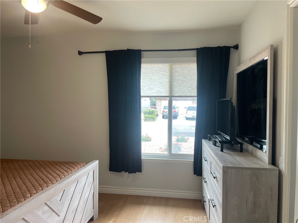 26592 Farrell Street Menifee, CA 92586 - Photo 15 of 31 a view of room with flat screen tv and windows