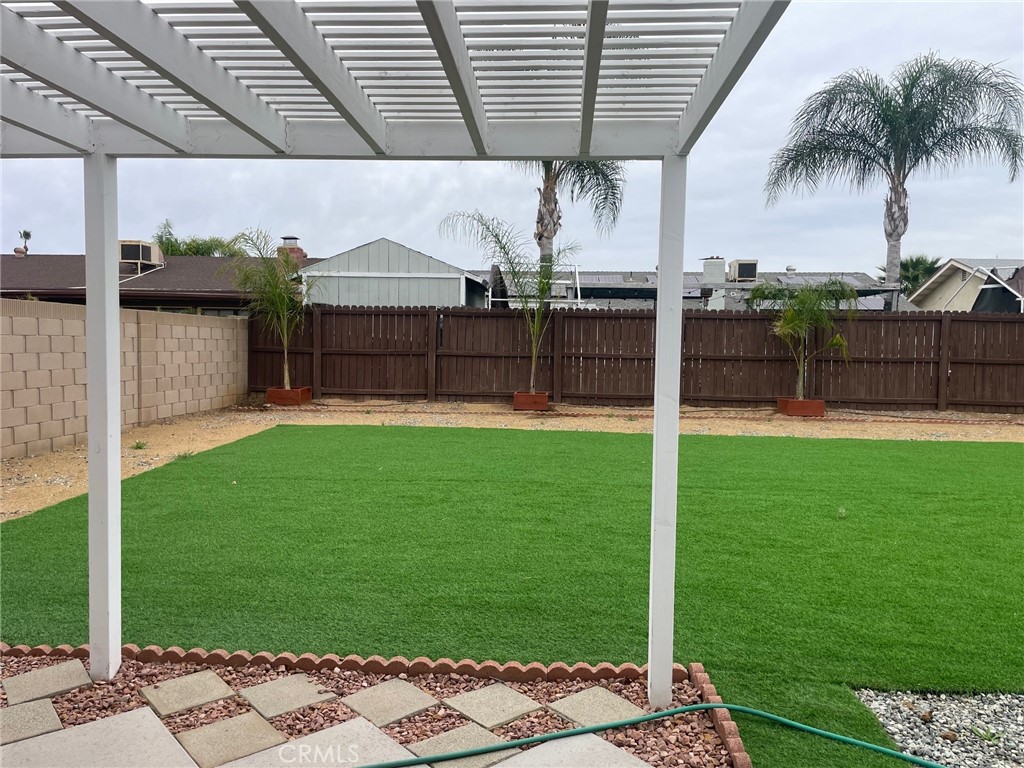 26592 Farrell Street Menifee, CA 92586 - Photo 27 of 31 a view of a backyard with a garden