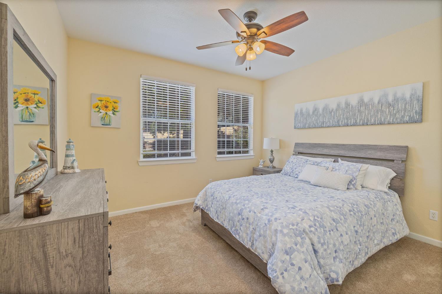 34811 Wintergreen Loop North Fork, CA 93643 - Photo 20 of 76 a bedroom with a bed and a window