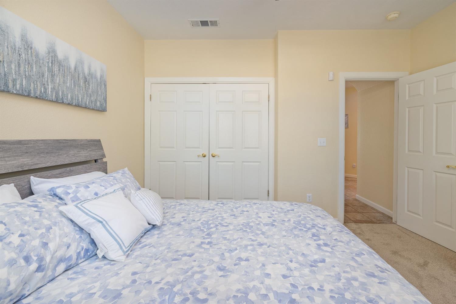 34811 Wintergreen Loop North Fork, CA 93643 - Photo 21 of 76 a bedroom with a bed and a window