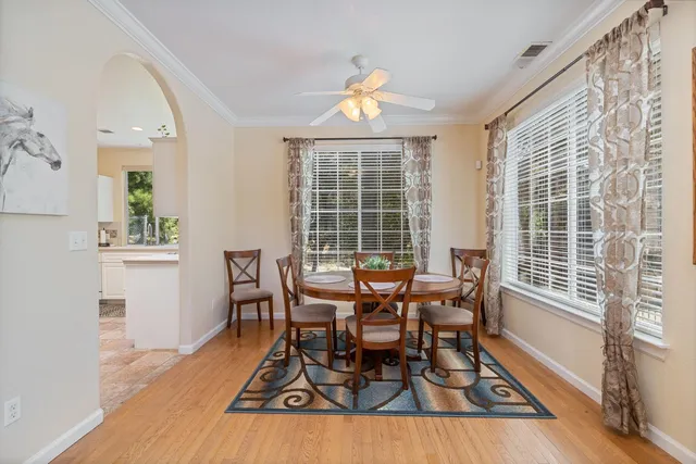 a living room with furniture fireplace and flat screen tv