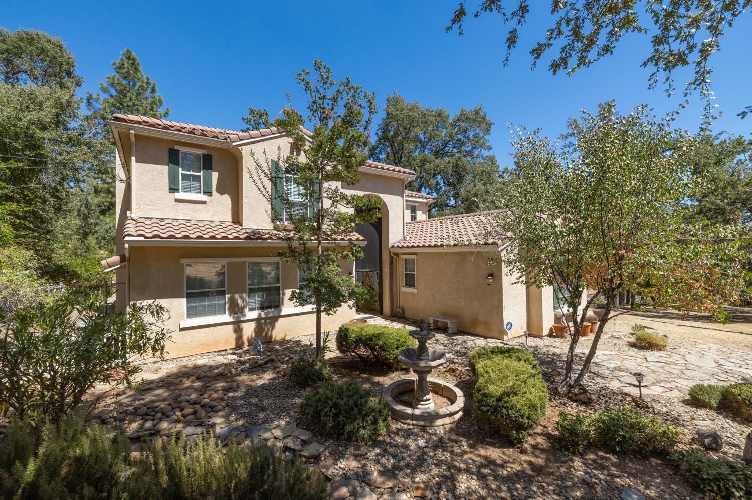 34811 Wintergreen Loop North Fork, CA 93643 - Photo 58 of 76 a view of a house with a yard