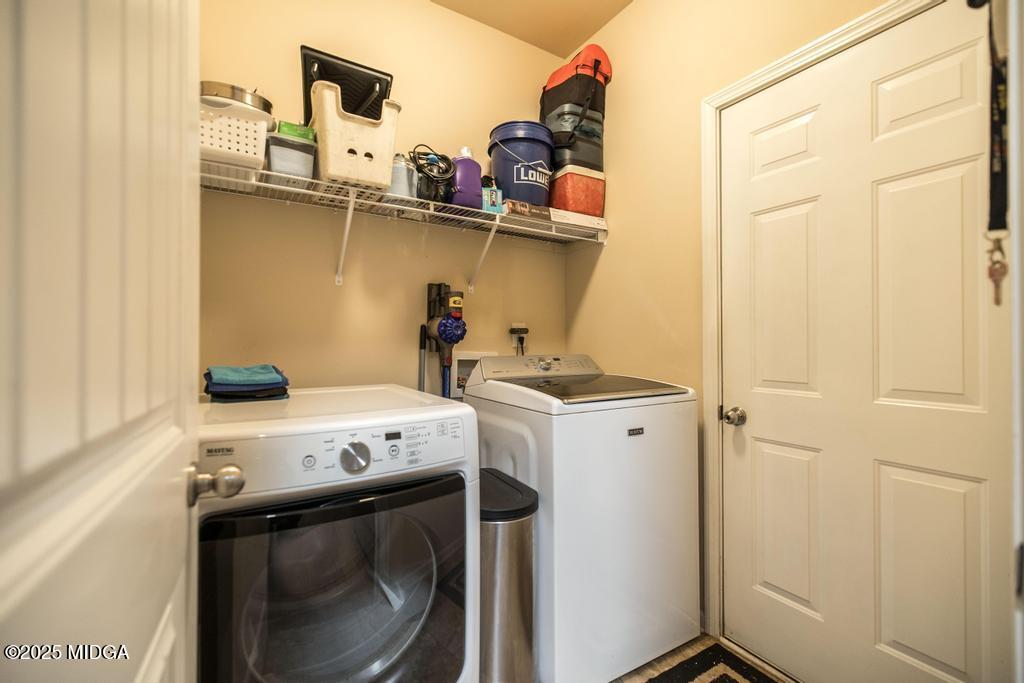 135 Abelia Lane Byron, GA 31008 - Photo 21 of 32 a utility room with dryer and washer