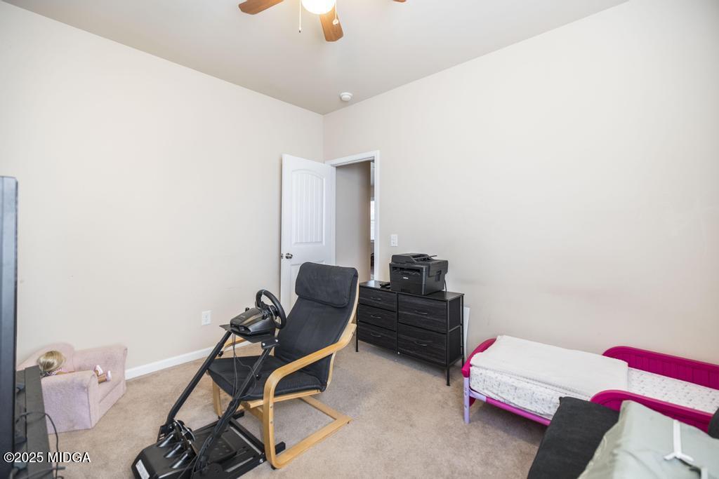 135 Abelia Lane Byron, GA 31008 - Photo 26 of 32 a room with a workspace