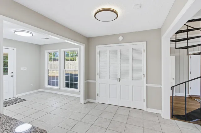 an empty room with windows