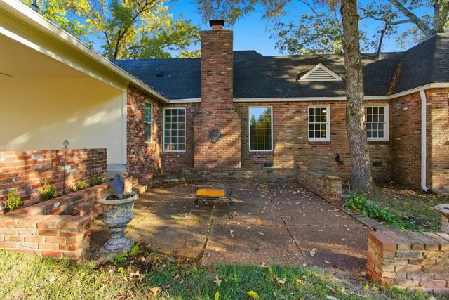 a view of entrance gate of a house