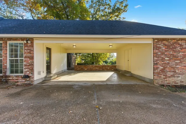 a view of a backyard of a house