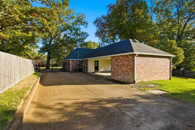 a front view of a house with yard