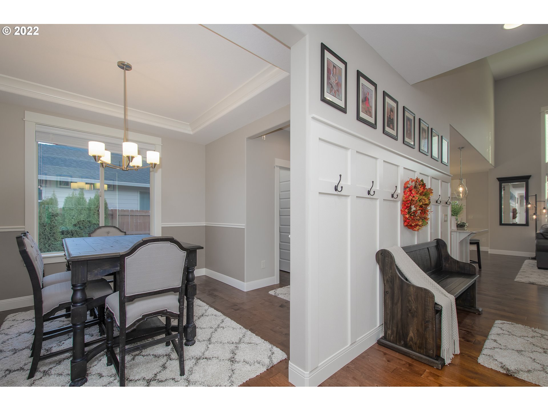 2507 Northeast 176th Street Ridgefield, WA 98642 - Photo 4 of 32 a view of a dining room with furniture window and wooden floor