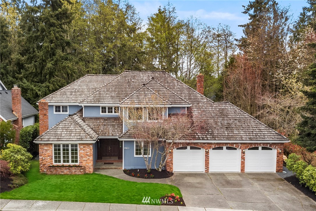 front view of a house with a garden