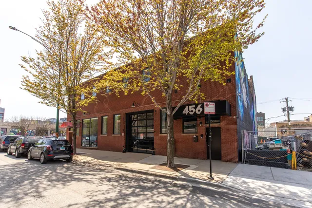 a view of a car park in front of house
