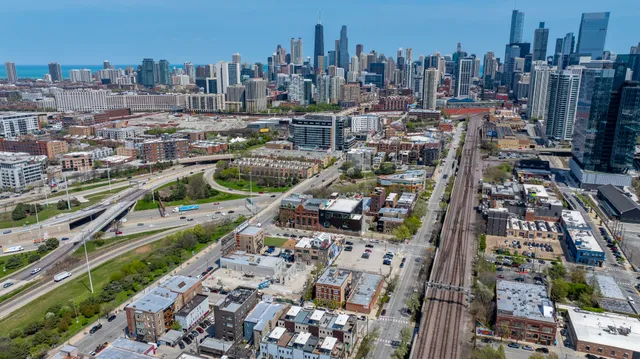 a view of a gym with wooden floor