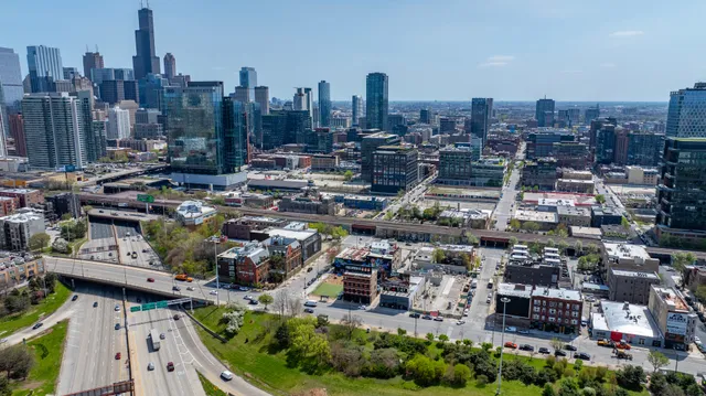 a view of a hall with wooden floors