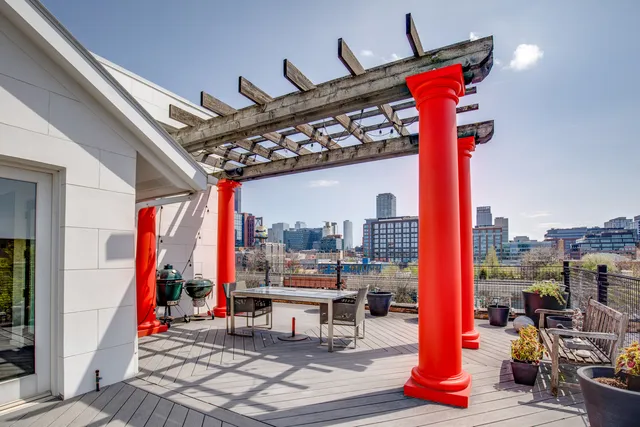 a view of a swimming pool with a patio