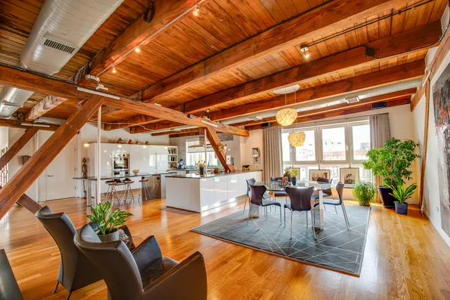 a view of a dining room with furniture