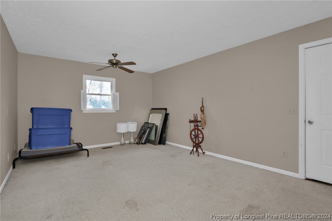 417 Farm Life School Road Carthage, NC 28327 - Photo 14 of 33 a room with furniture and windows